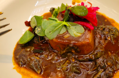 Maximo Bistrot signature dishes Wood Grilled Wagyu Cross Beef New York Strip
Beef Wellington
Stone Crab And Mole Verde "Tlayuda"